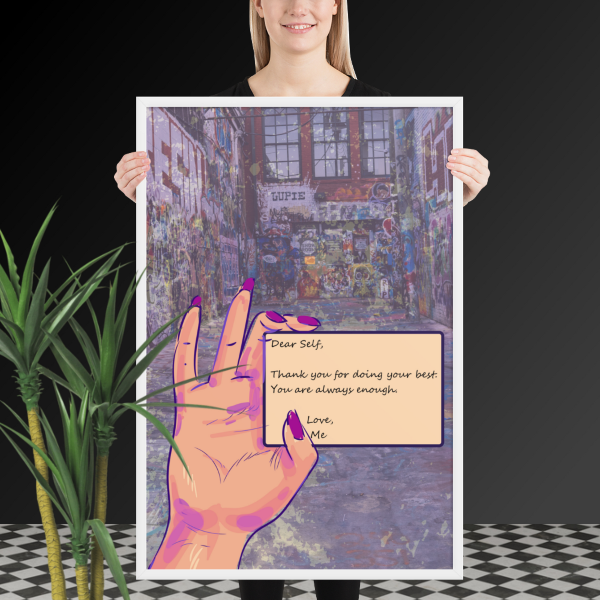 A woman holding up a poster with an image of a hand promoting Empowering 'Self Love Letter' Mixed Media Graffiti Art - Printable Wall Art Quotes to Inspire Self-Compassion.
