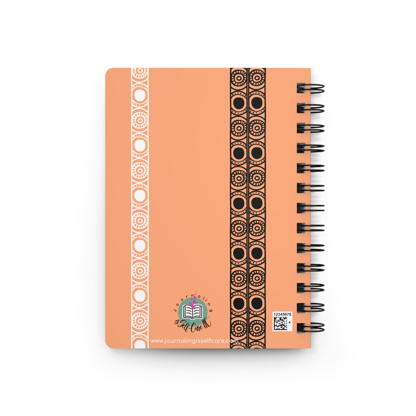 A "Manifest That Shit" manifesting journal with a black and orange design.