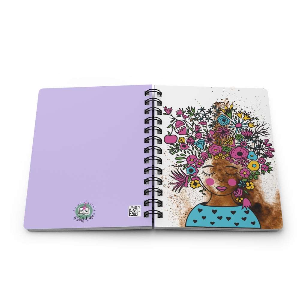 A Paint Splattered Floral Journal for Women, perfect for self-expression and journaling with a beautiful image of a woman adorned with flowers on her head.