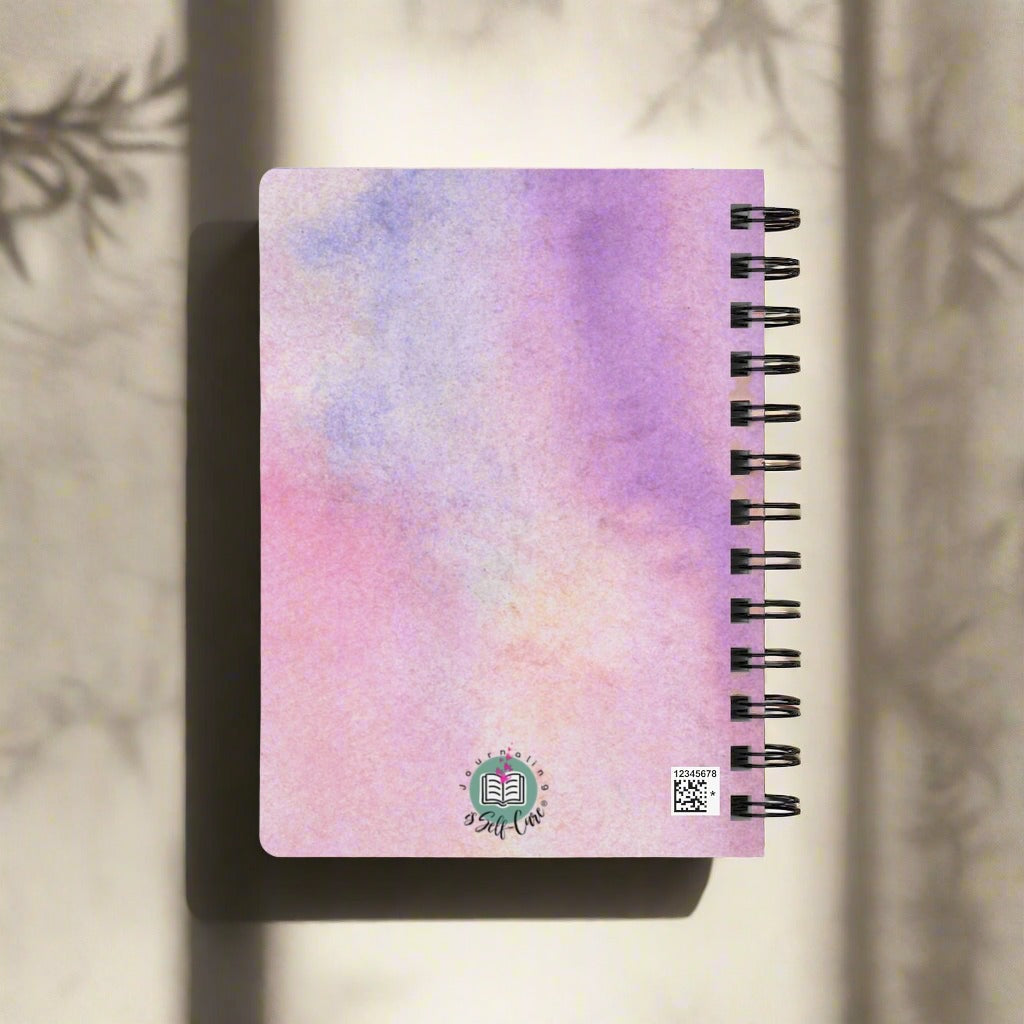A Trauma Healing Journal for Women with a pink and purple watercolor design, perfect for a trauma healing journal or for practicing self-love and mindset shift.