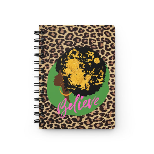 A spiral notebook with a leopard print cover and the word "Believe in Your Dreams" Inspirational Black Girl Magic Journal, perfect for journal prompts and fostering Black Girl Magic.