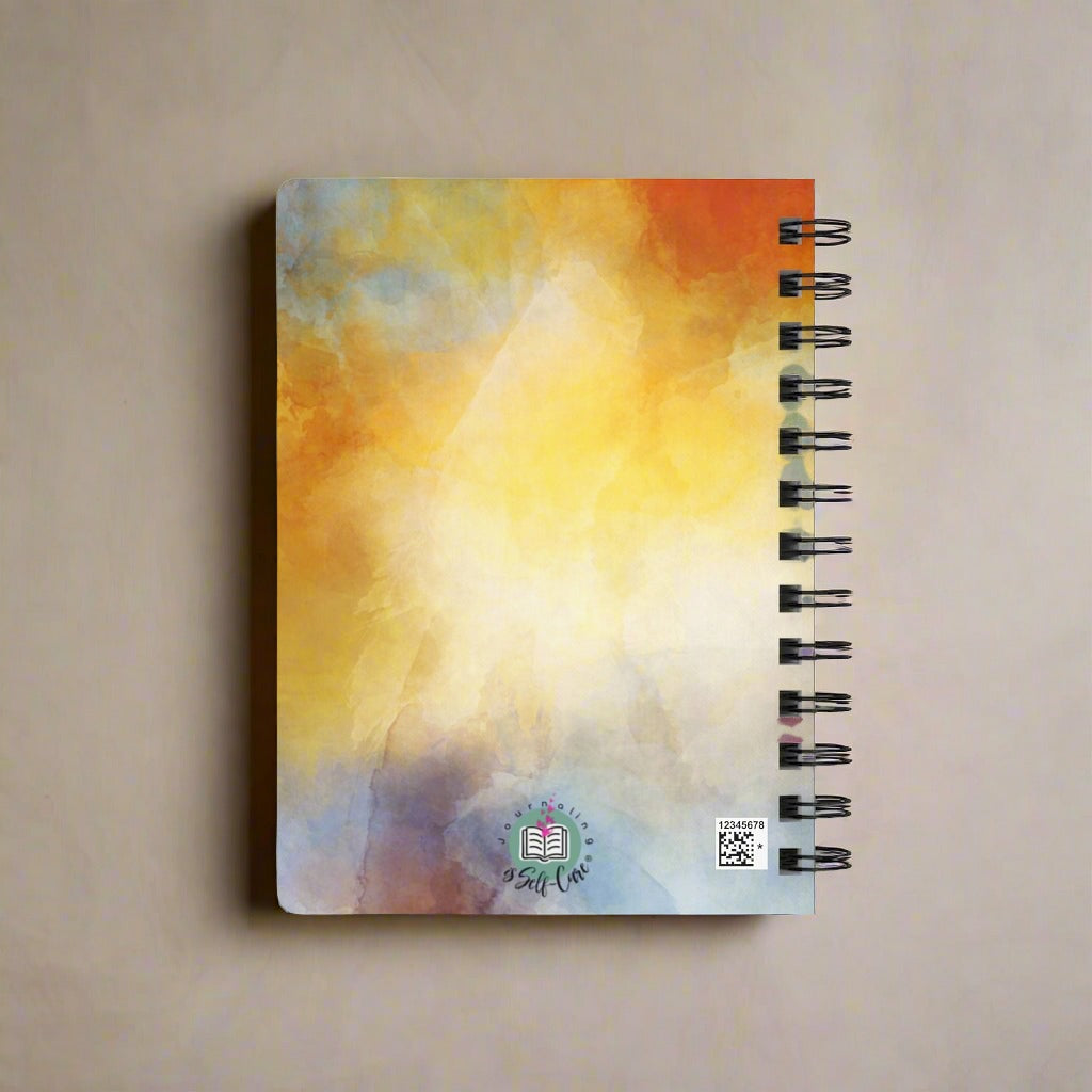 A Gratitude Journal : A Journal For Women with an orange, yellow and blue design.