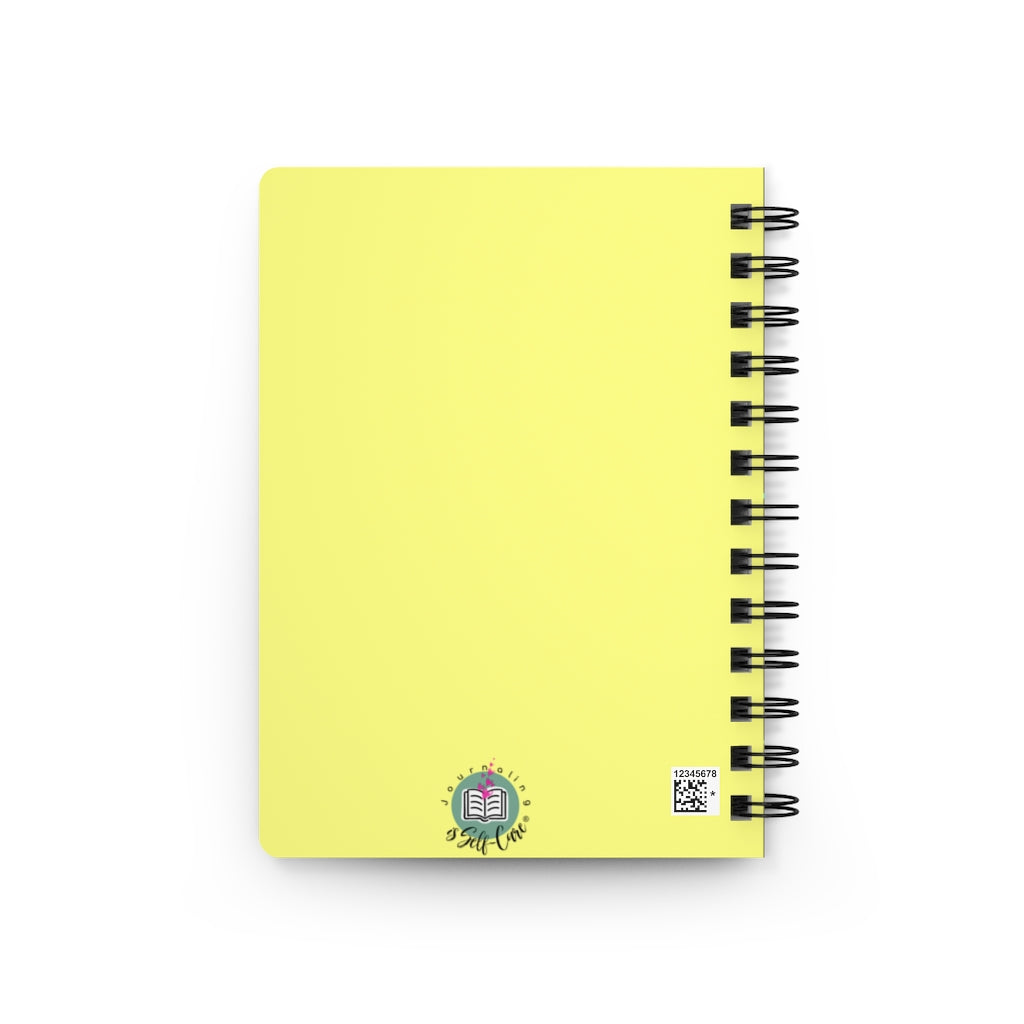 A yellow spiral "Set Yourself Free" Paint Splatter Journal adorned with a beautiful flower, perfect for self-love journaling and manifestation.